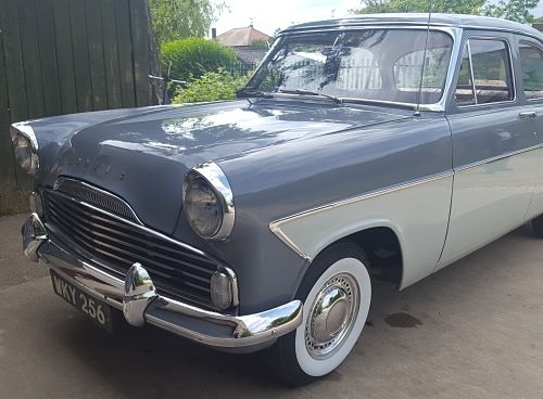 Ford Zodiac fitted with 6.40 x 13 Camac and whitewall flaps