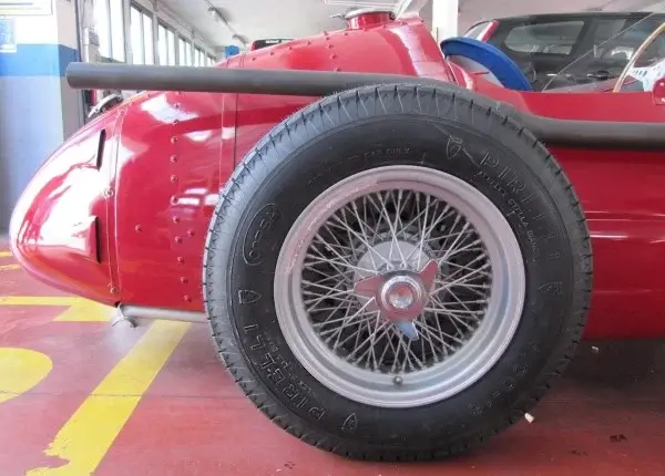 Click to enlarge 6.00-16 PIRELLI STELLA BIANCA Tires on a Ferari 250F