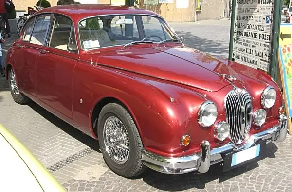 Red Jaguar MKII on Borrani Wheels and 180 HR 15 Michelin XAS Tires